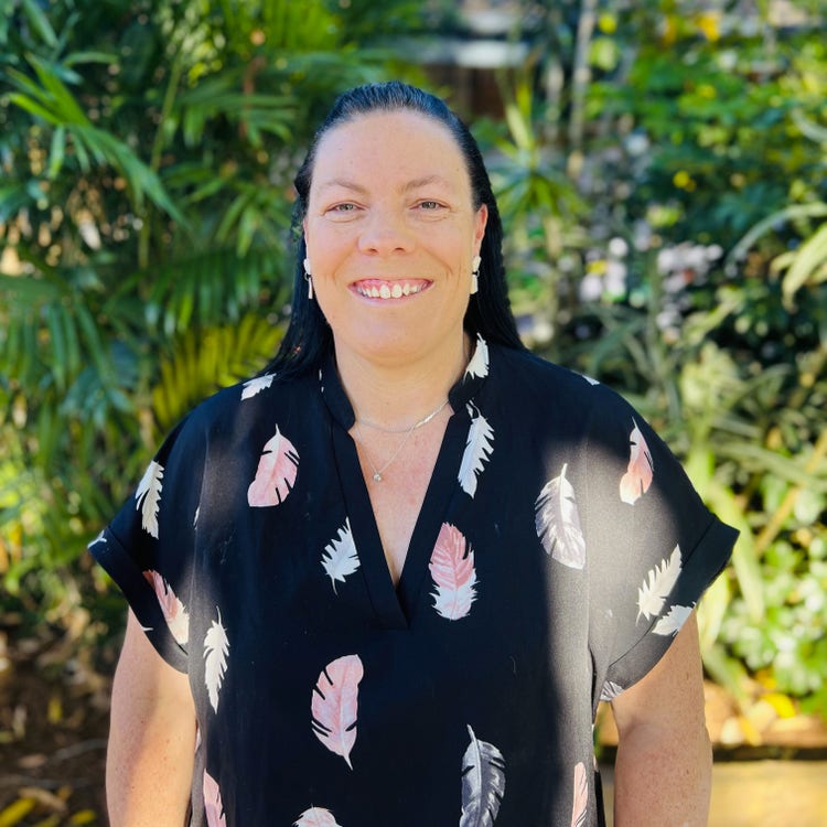 Last/library teacher smiling