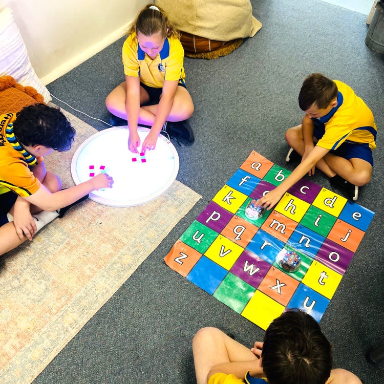 Students playing with a range of technology