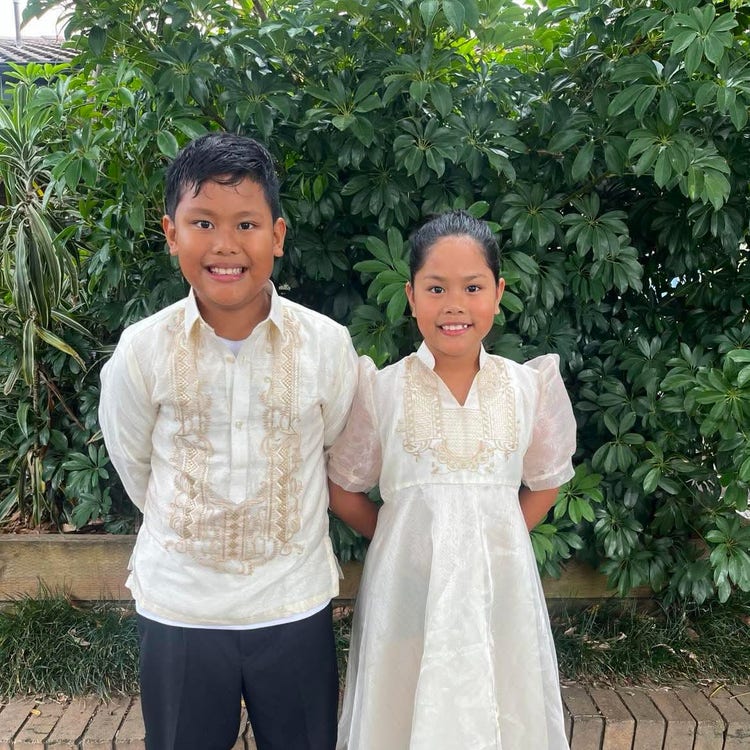 Brother and sister in traditional dress