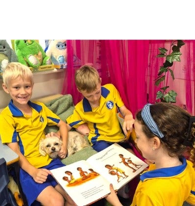 3 students reading together