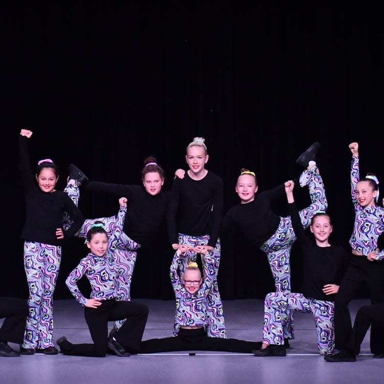 Dance group posing at Hunter Dance Performance